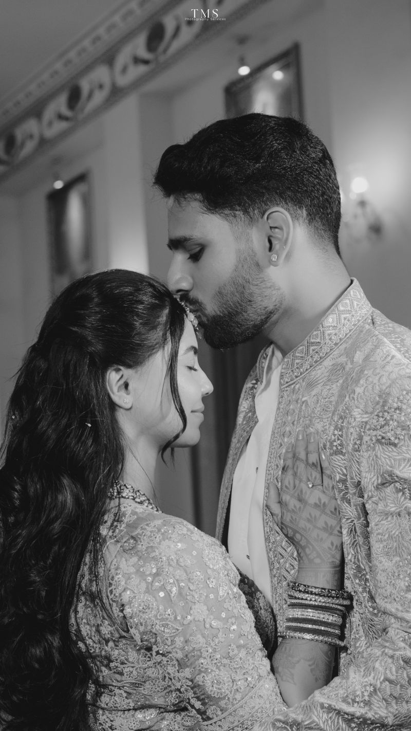 Traditional Indian wedding ceremony shot of Uday and Isha